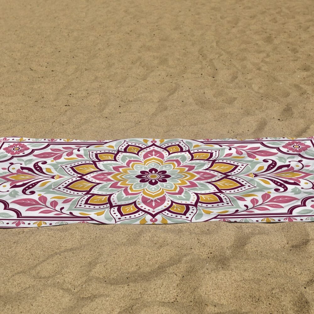 white beach towel psd mockup laying on the sand